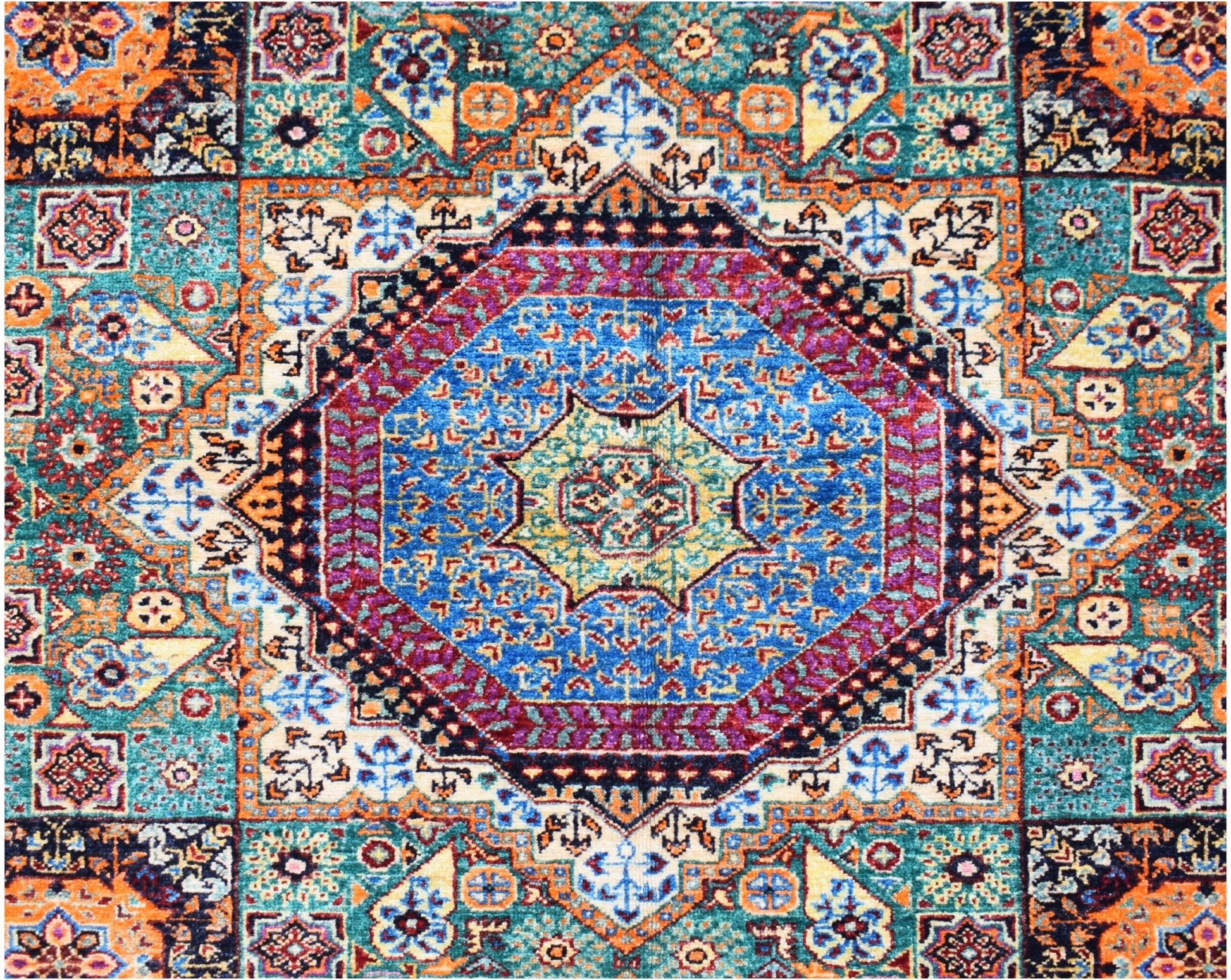A handmade Afghan Chobi rug featuring a complex geometric medallion in blue, red, and gold tones.