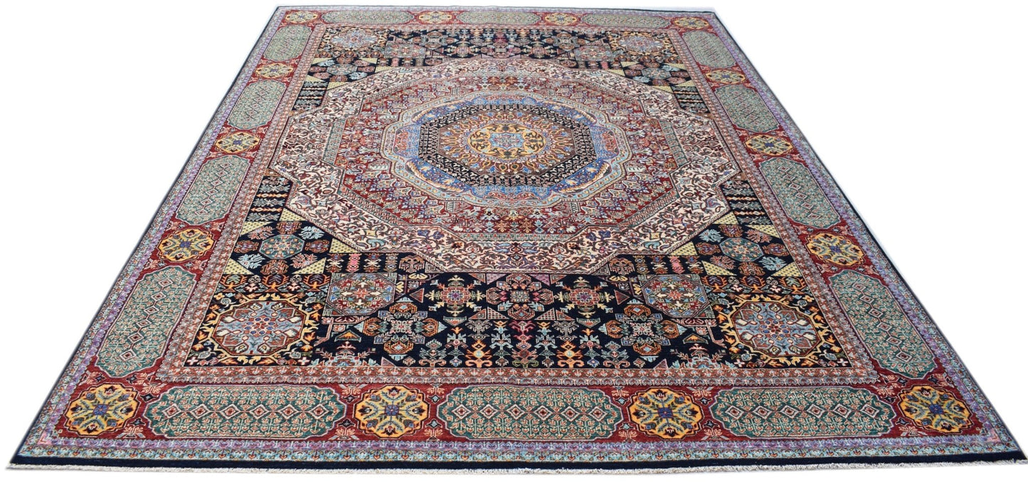 A rectangular Afghan Mamluk rug featuring a complex geometric medallion and intricate floral motifs.