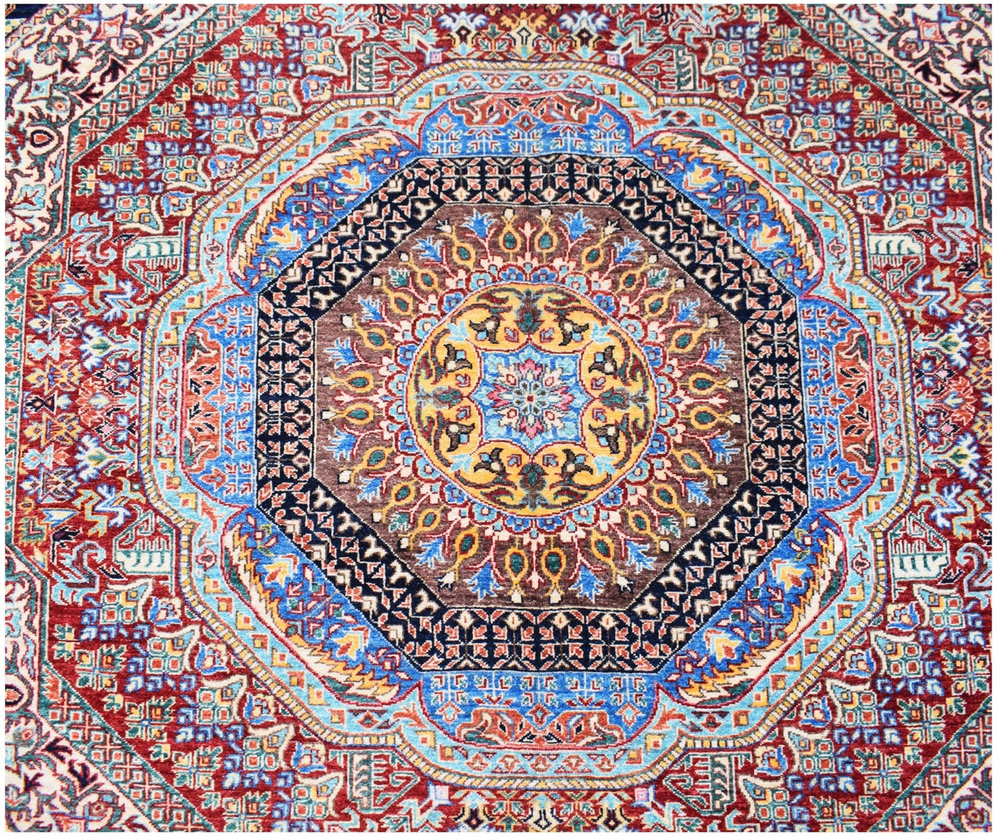A handmade Afghan Chobi rug featuring a complex, colorful Mamluk medallion design.