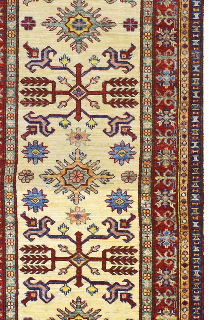 Handmade Afghan Super Kazakh runner rug featuring traditional geometric patterns in red and blue.