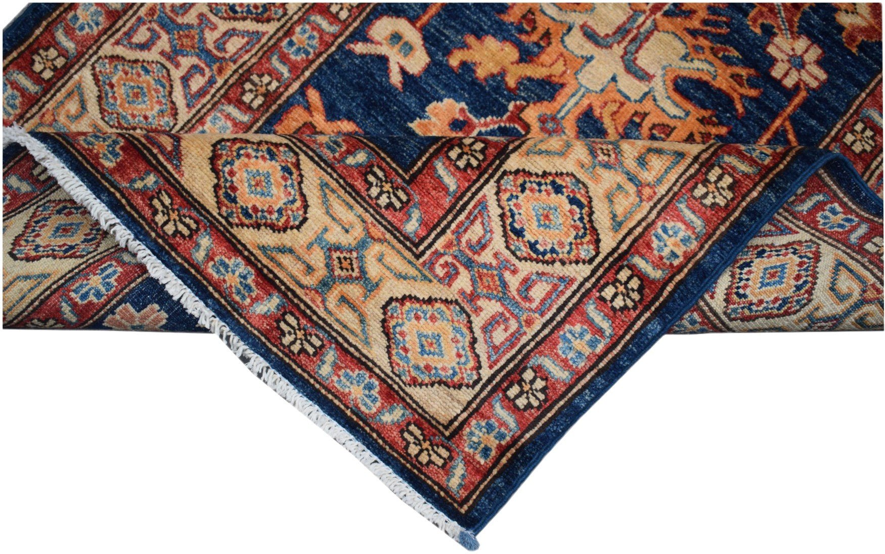 A handmade Afghan Super Kazakh runner featuring a traditional geometric pattern in blue and red.