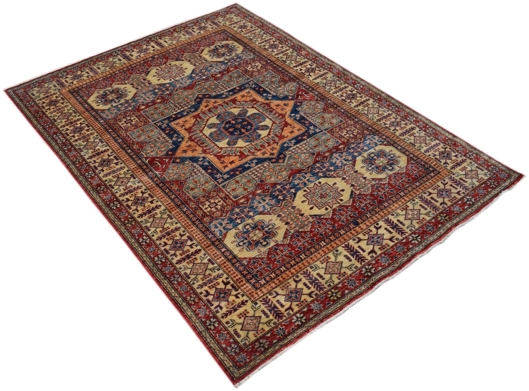 Handmade Afghan Super Kazakh rug featuring a geometric medallion pattern in red, blue, and cream.