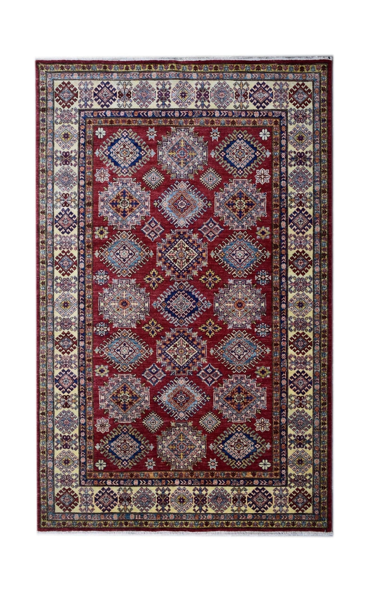 Handmade Afghan Super Kazakh rug featuring a geometric pattern in red, blue, and cream tones.