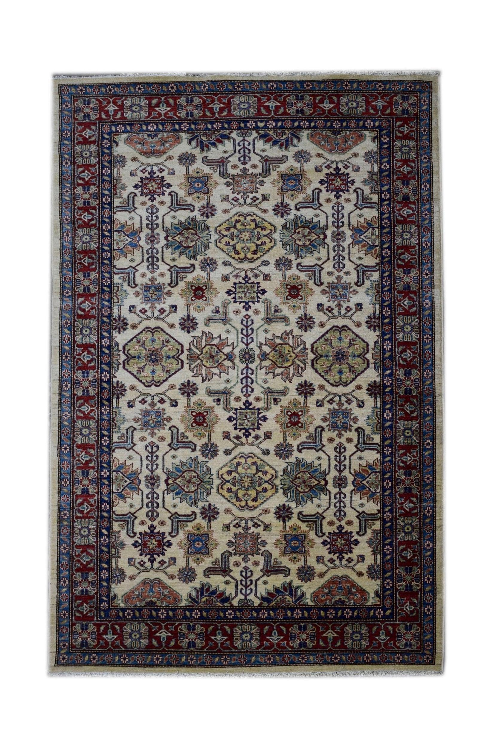 Handmade Afghan Super Kazakh rug featuring a traditional geometric pattern in red, blue, and cream.