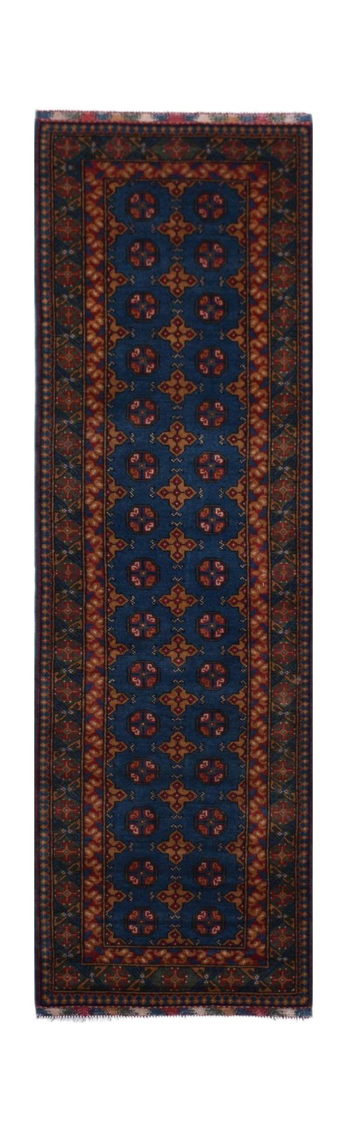 A handmade vintage Afghan Turkmen runner featuring geometric patterns in blue and deep red.