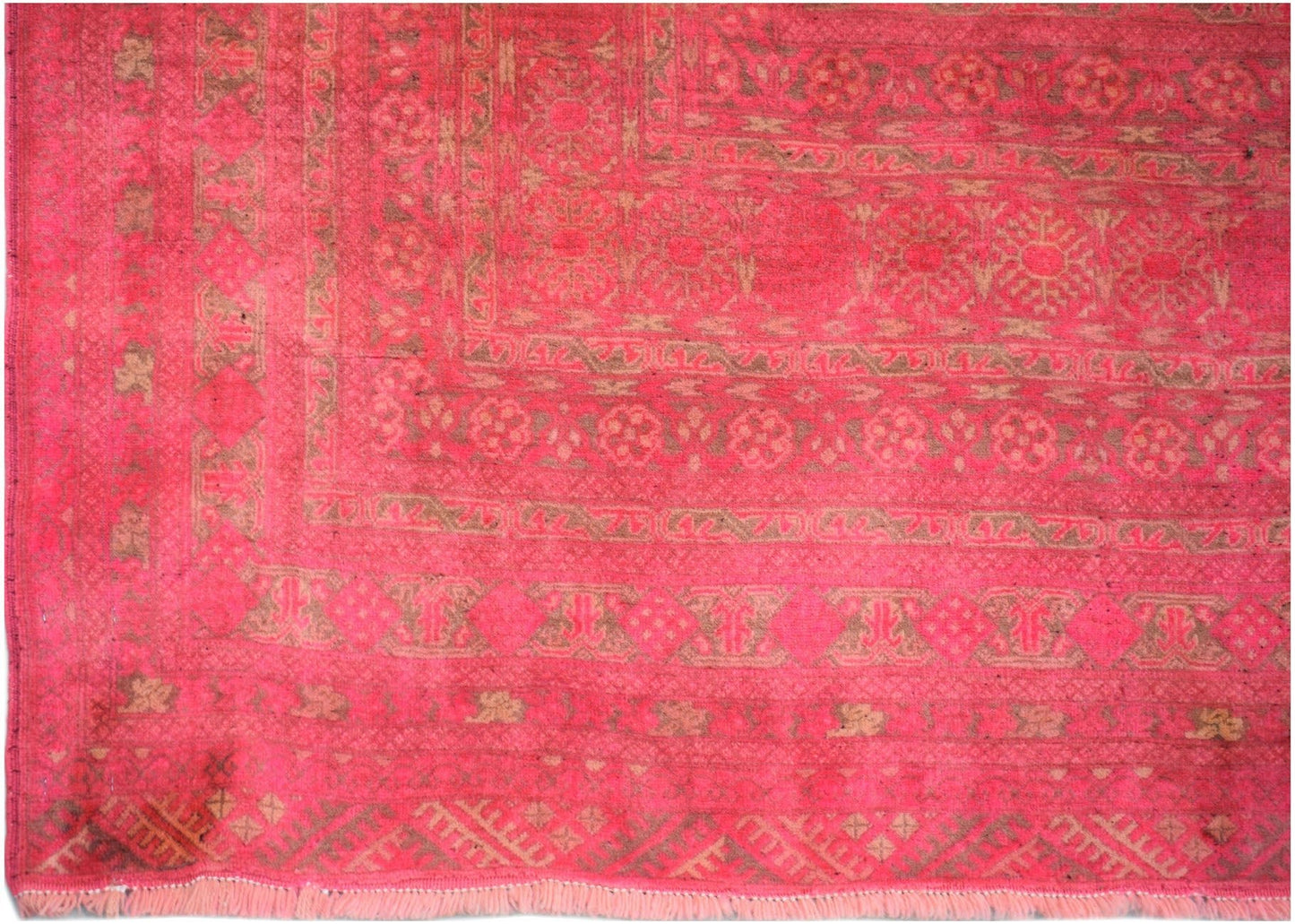 A vintage handmade Afghan Turkmen rug featuring intricate geometric patterns in shades of pink.