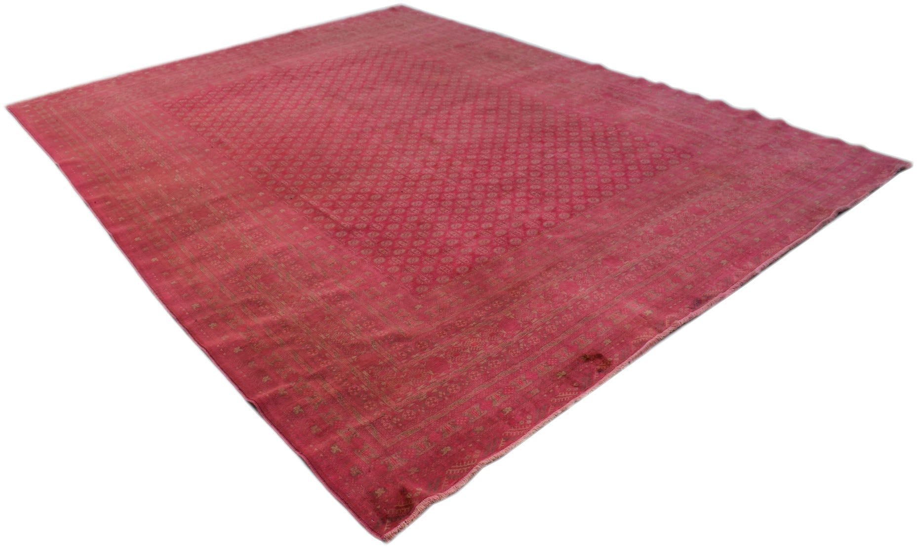 A vintage Afghan Turkmen rug featuring a geometric pattern in shades of red and muted gold.