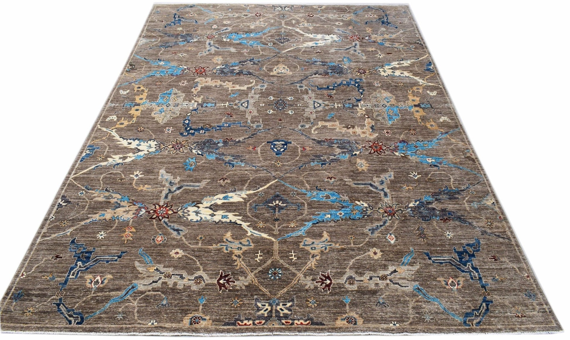Handwoven Afghan Chobi rug featuring a traditional Bidjar pattern in brown and blue tones.