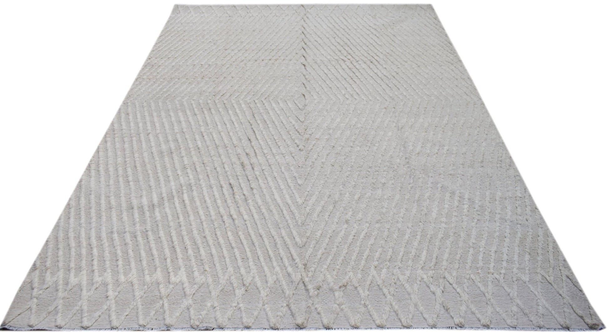 An Afghan Yekta rug featuring a textured, cream-colored geometric diamond pattern.
