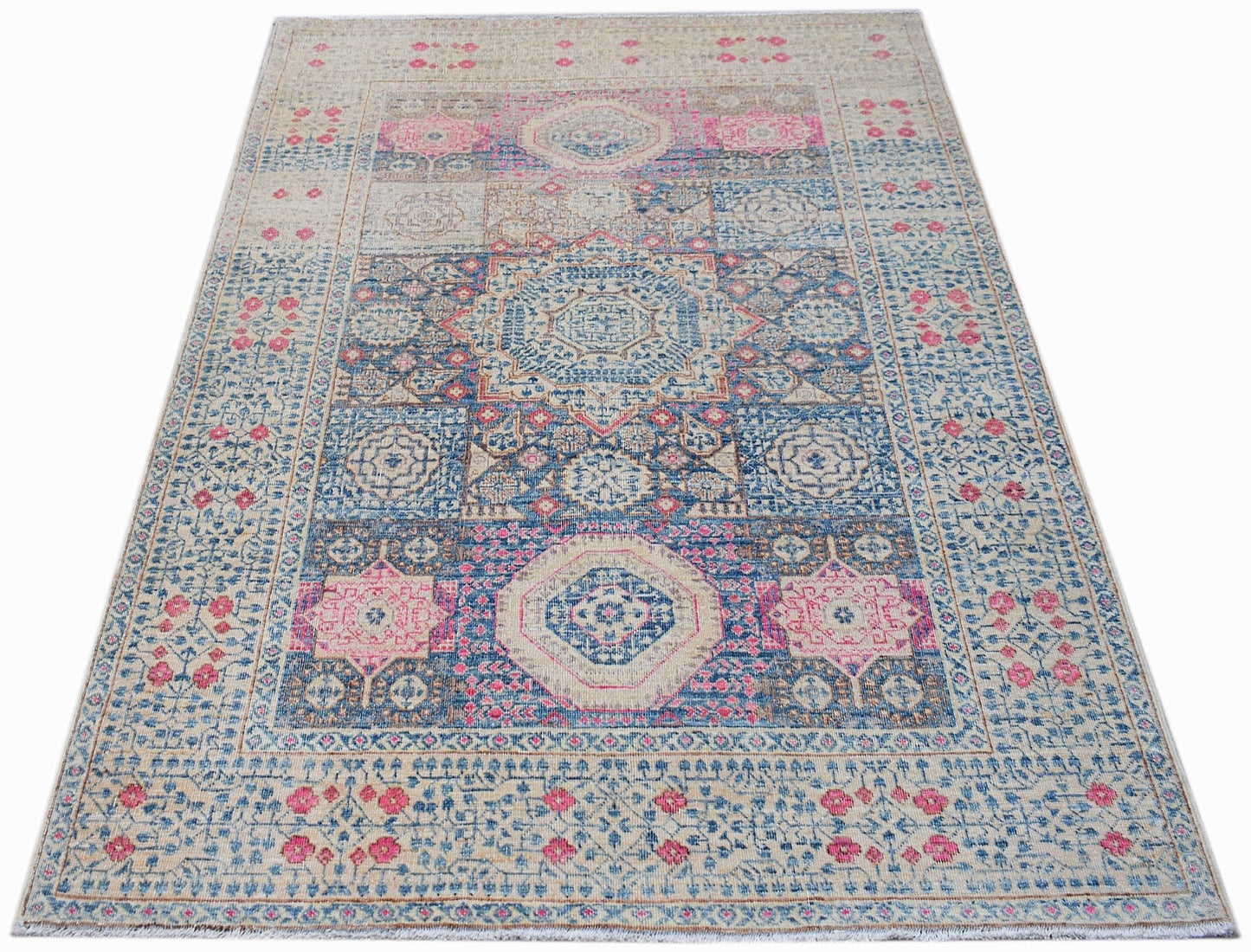 Handwoven Afghan Balkh rug featuring a traditional Mamluk medallion pattern in blue and pink.