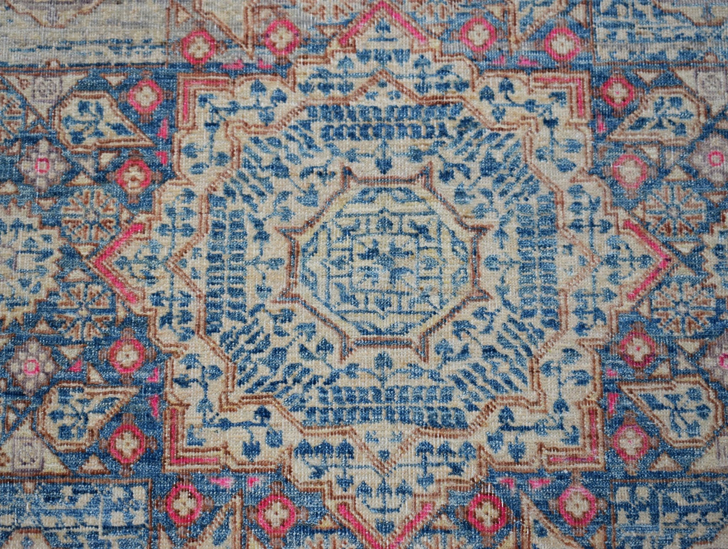 A handmade Afghan Balkh rug featuring a detailed blue and beige Mamluk medallion pattern.
