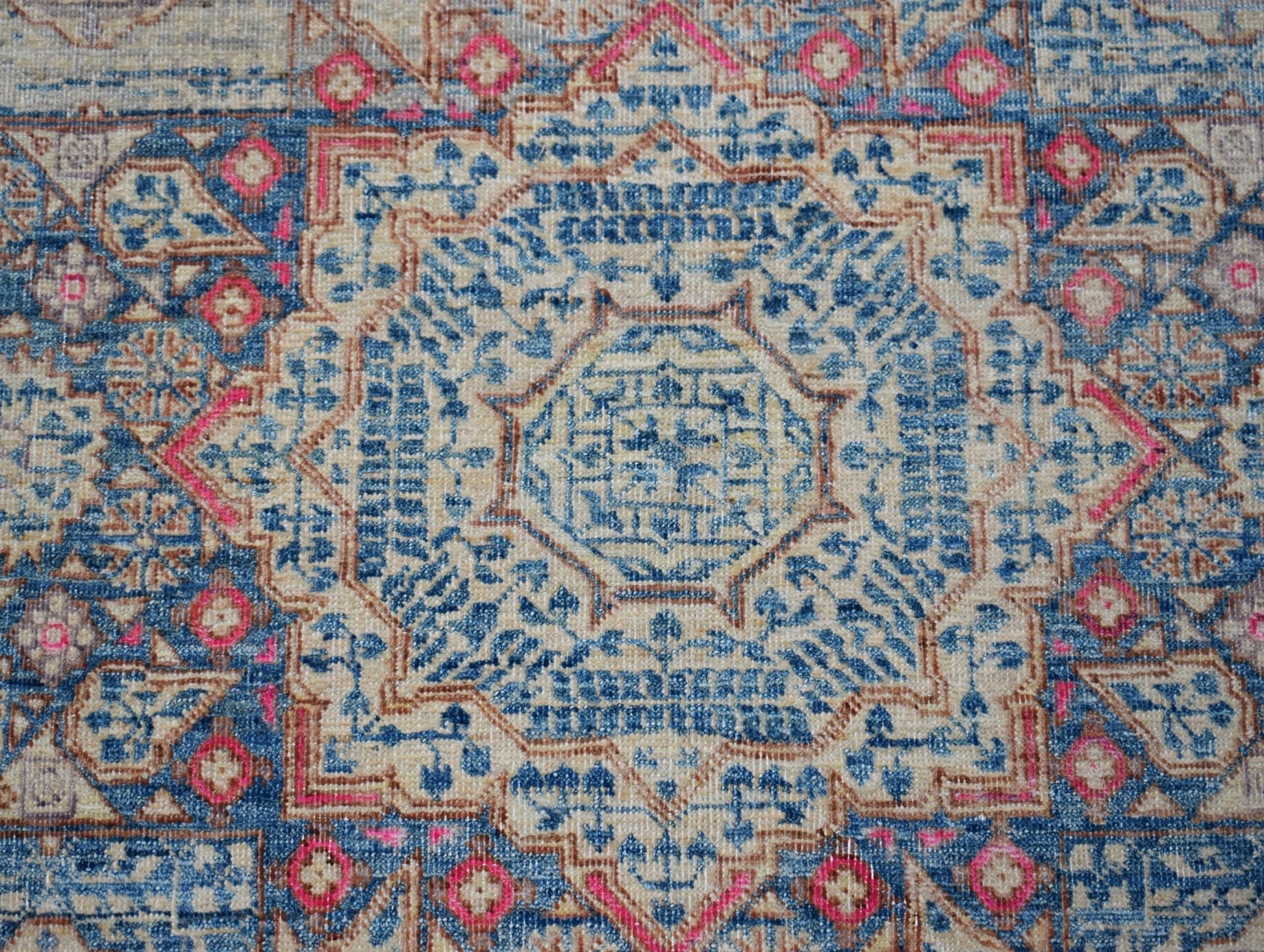 A handmade Afghan Balkh rug featuring a detailed blue and beige Mamluk medallion pattern.