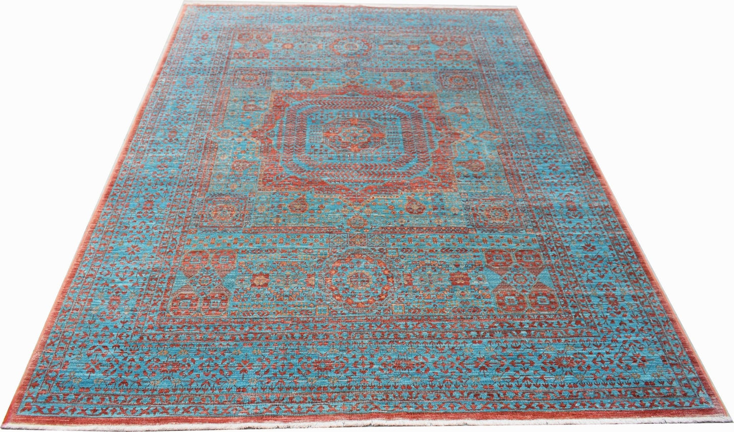 A rectangular Afghan Chobi rug featuring a detailed Mamluk medallion pattern in blue and red.