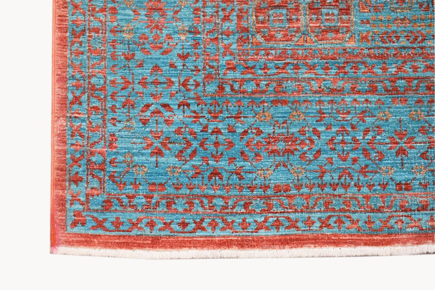 A handmade Afghan Chobi rug featuring a detailed Mamluk pattern in vibrant red and blue tones.