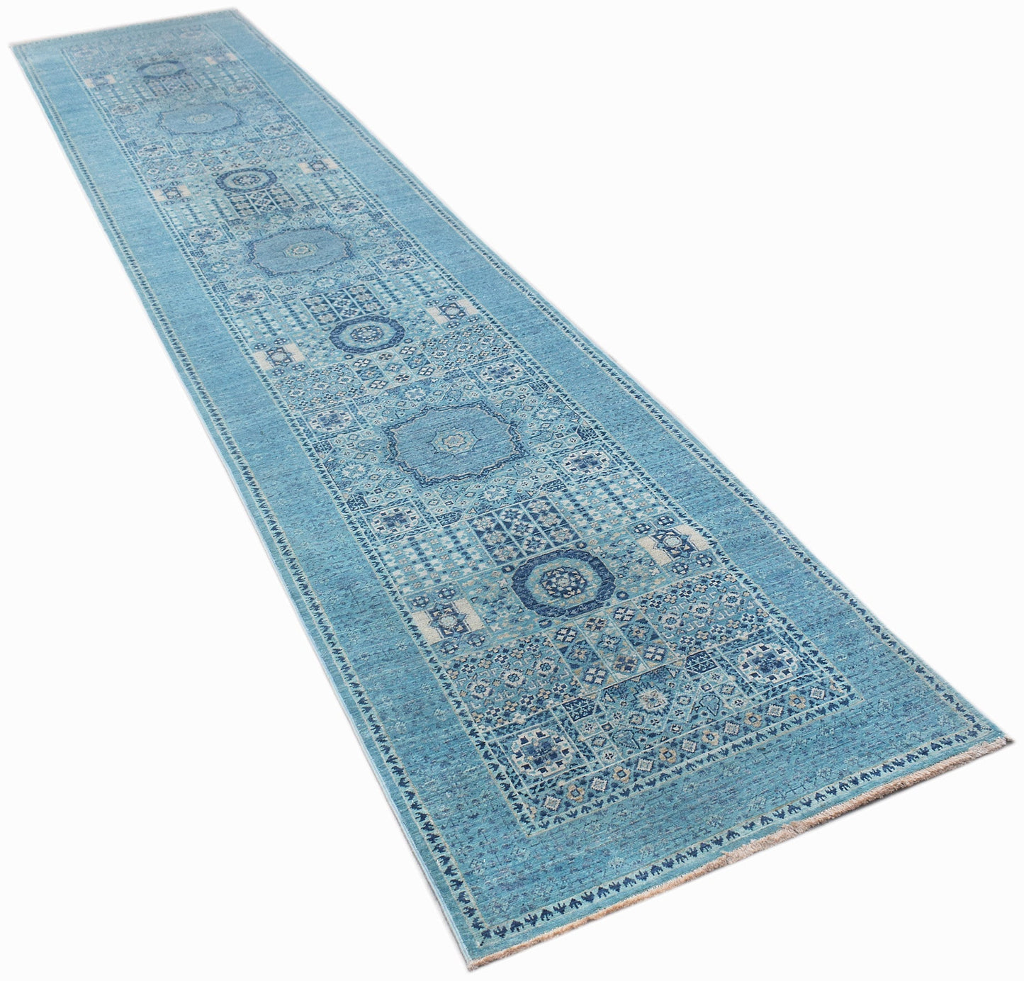 A handmade Afghan Chobi runner rug featuring a blue Mamluk pattern with intricate medallions.