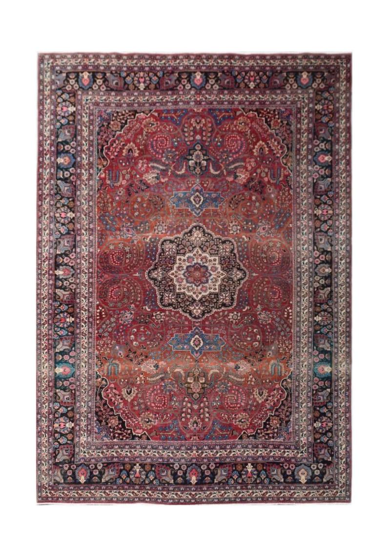 A rectangular vintage Persian rug featuring a central medallion on a red floral patterned field.