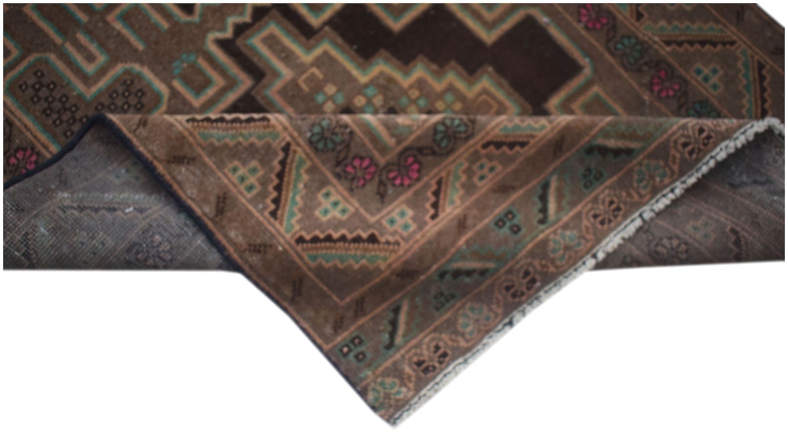 A vintage handmade Afghan Baluch runner with a brown geometric pattern and floral accents.