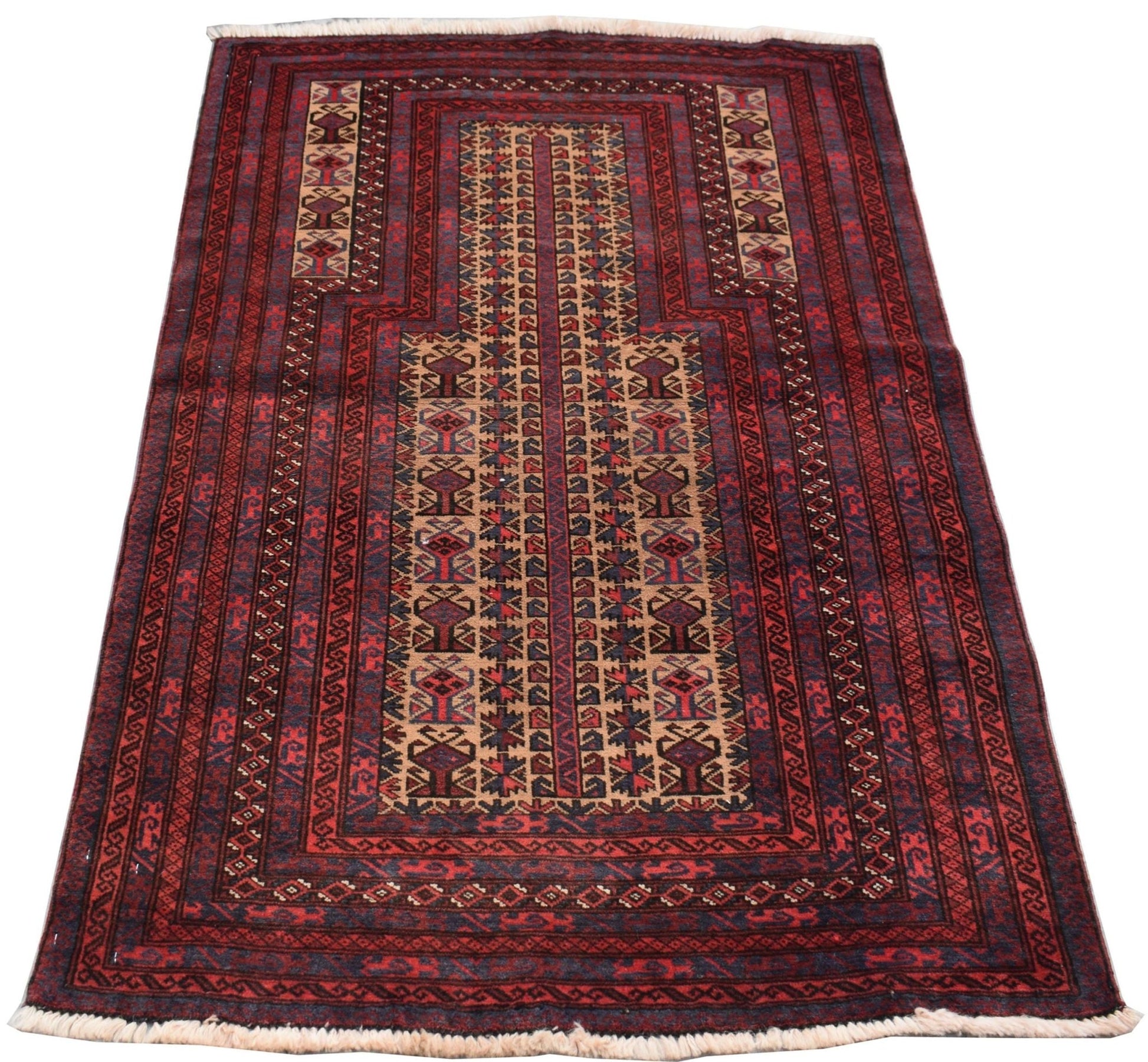 A handmade vintage Afghan Baluch rug featuring a traditional prayer design in red, brown, and blue.