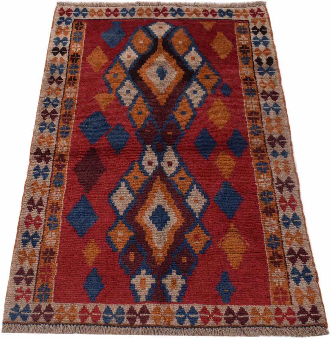 Handmade Afghan Pashm rug featuring a geometric diamond pattern in red, blue, and brown tones.