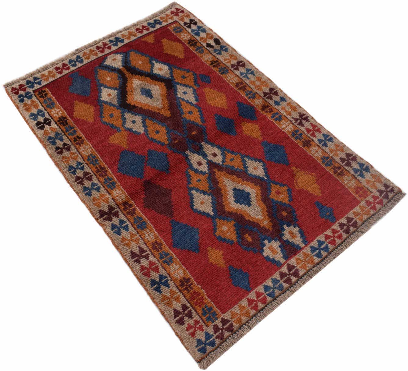 Handmade Afghan Pashm rug featuring a geometric diamond pattern in red, blue, and ivory wool.