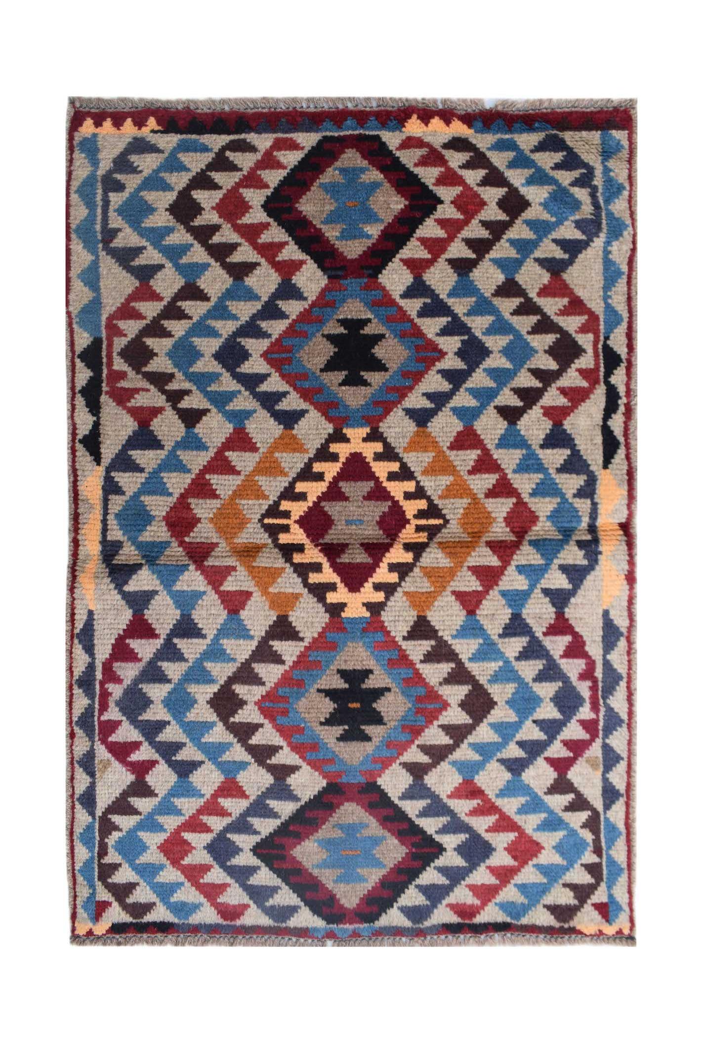 Handmade Afghan Pashm rug featuring a geometric diamond pattern in red, blue, and brown tones.
