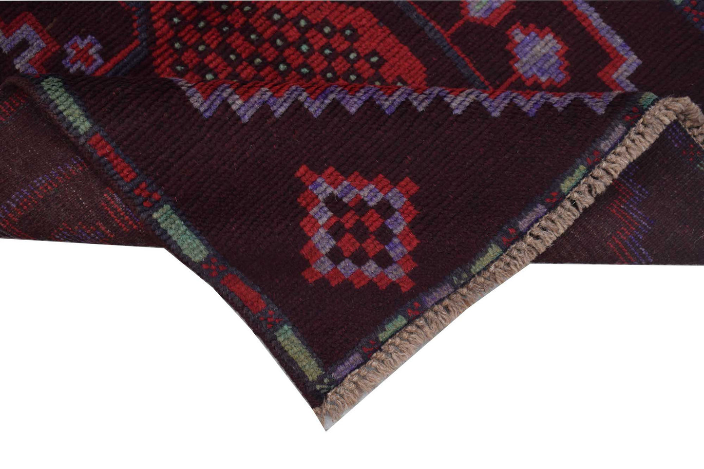 A handmade Afghan Pashm rug featuring geometric tribal patterns in deep red, brown, and blue.
