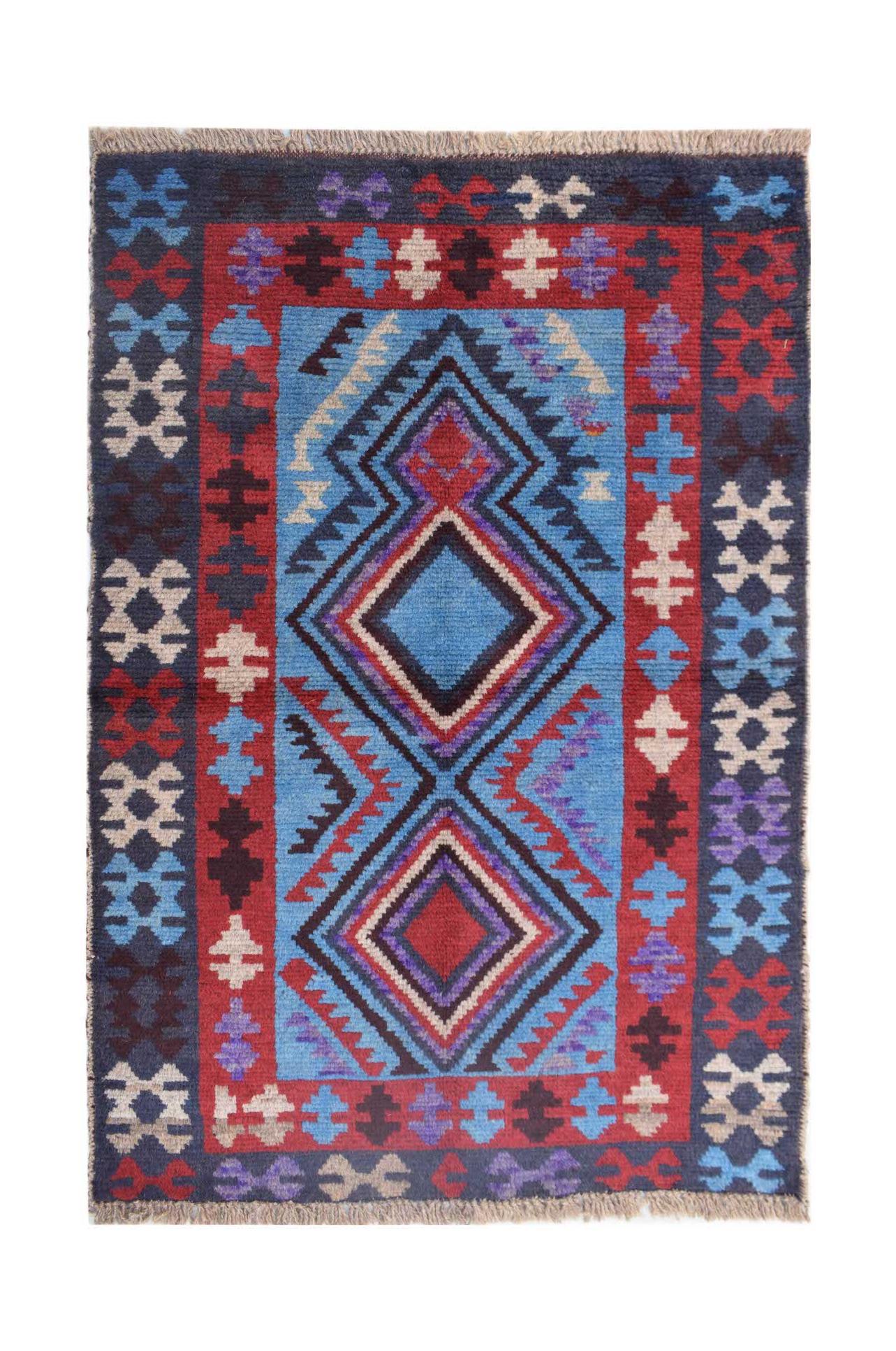 Handmade Afghan Pashm rug featuring a geometric diamond pattern in shades of blue, red, and brown.