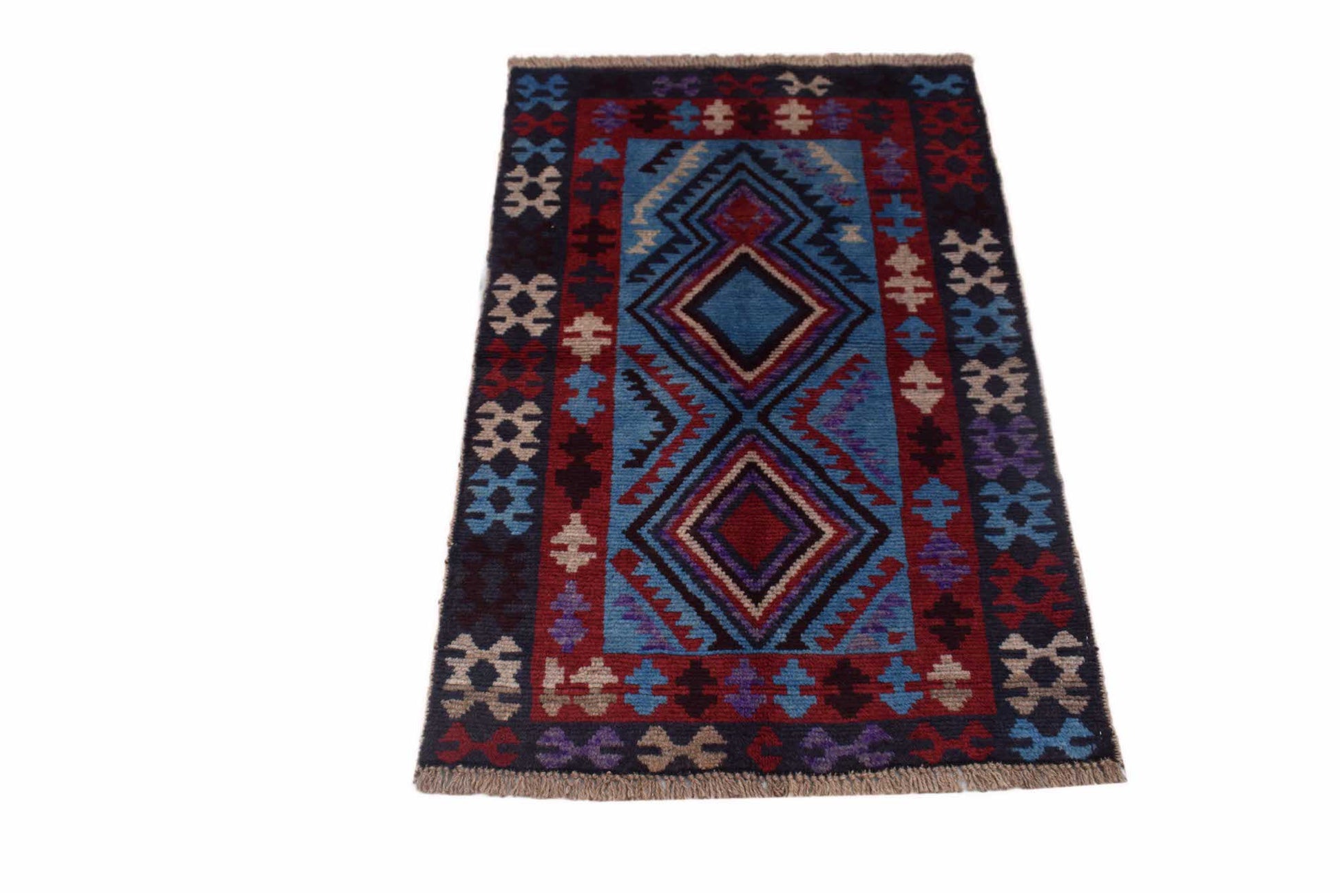Handmade Afghan Pashm rug featuring a geometric diamond pattern in shades of blue, red, and brown.