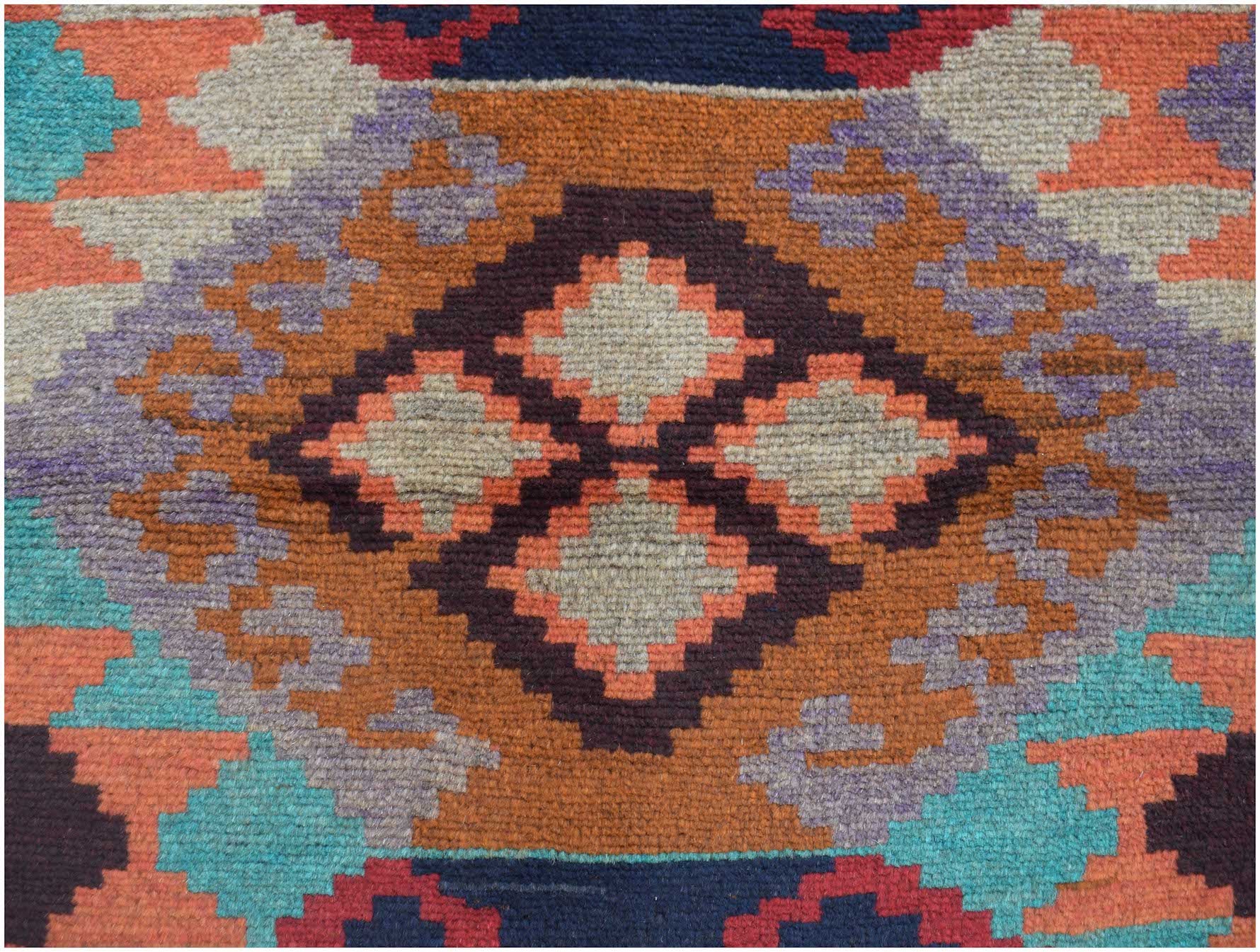 Handmade Afghan Pashm rug featuring a geometric tribal pattern in shades of orange, blue, and brown.