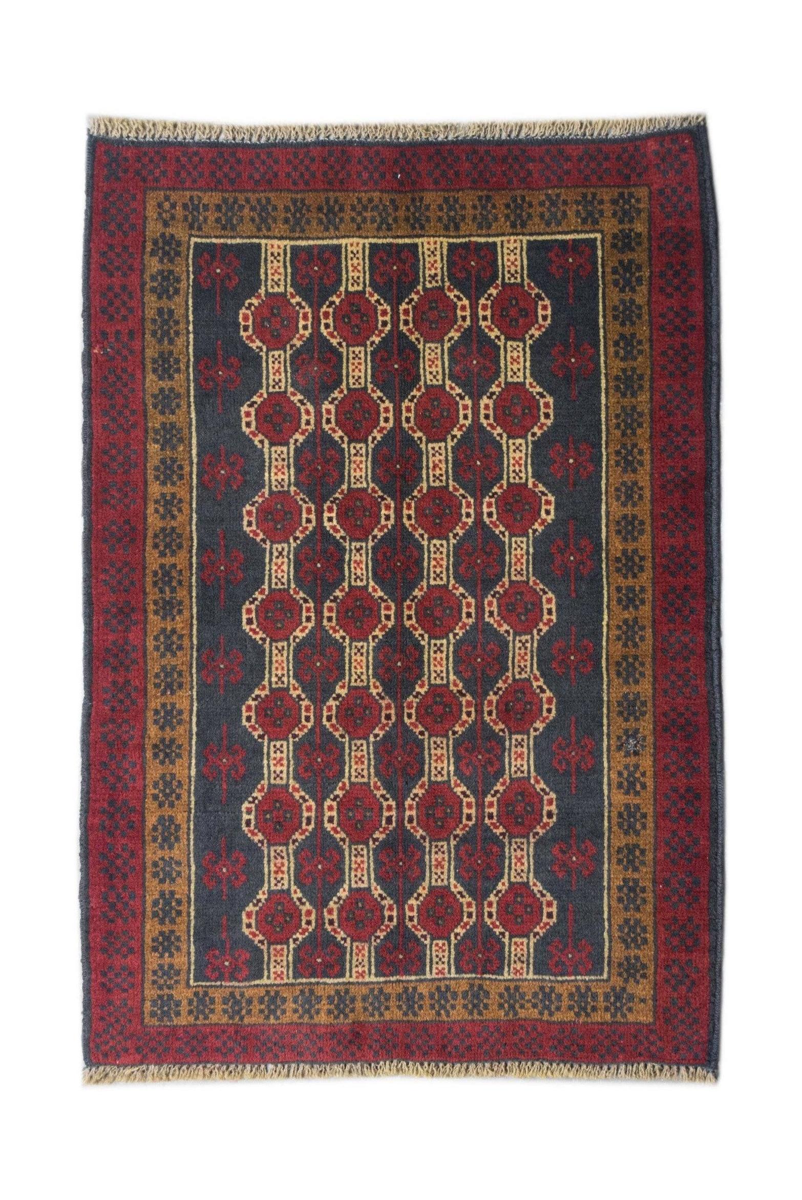 Handmade Afghan Pashm rug featuring a dark blue field with repeating red geometric patterns.