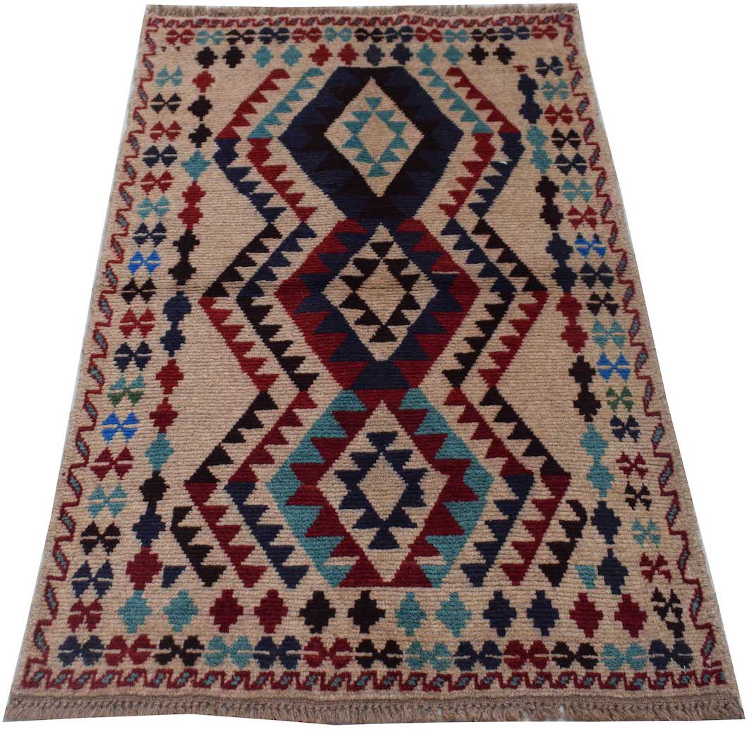 Handmade Afghan Pashm rug featuring a geometric diamond pattern in red, blue, and ivory wool.