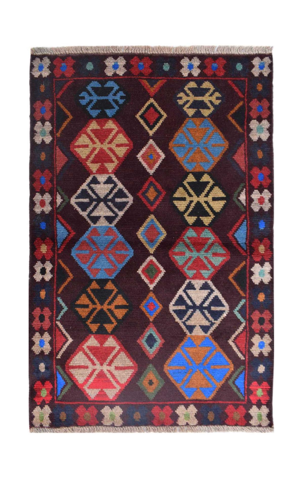 Handmade Afghan Pashm rug featuring geometric tribal patterns in dark red, blue, and brown wool.