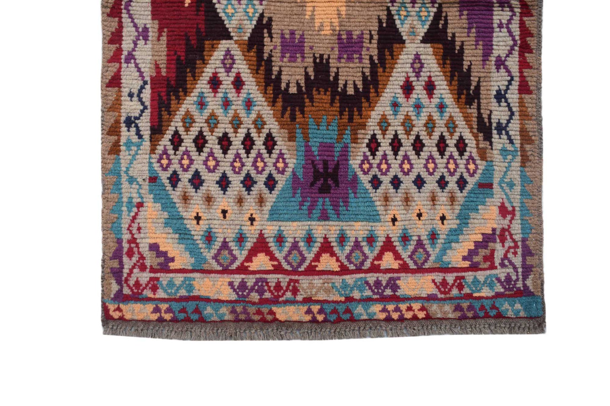 Handmade Afghan Pashm rug featuring geometric diamond patterns in red, blue, and brown wool.