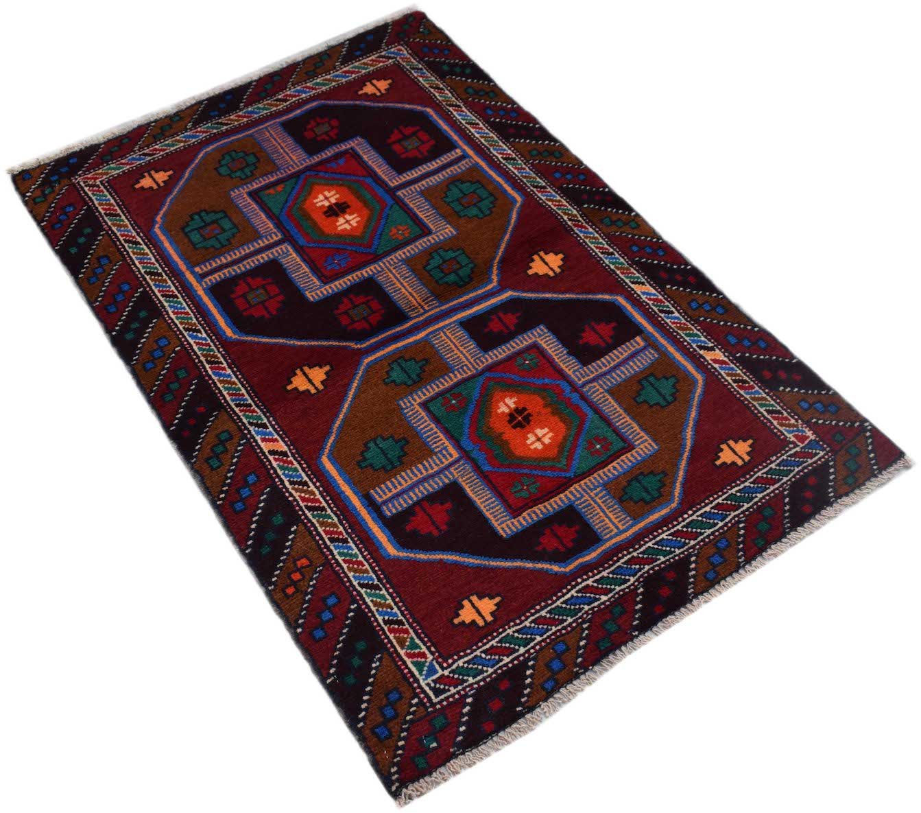 Handmade Afghan Pashm rug featuring geometric tribal patterns in deep red, brown, and blue tones.
