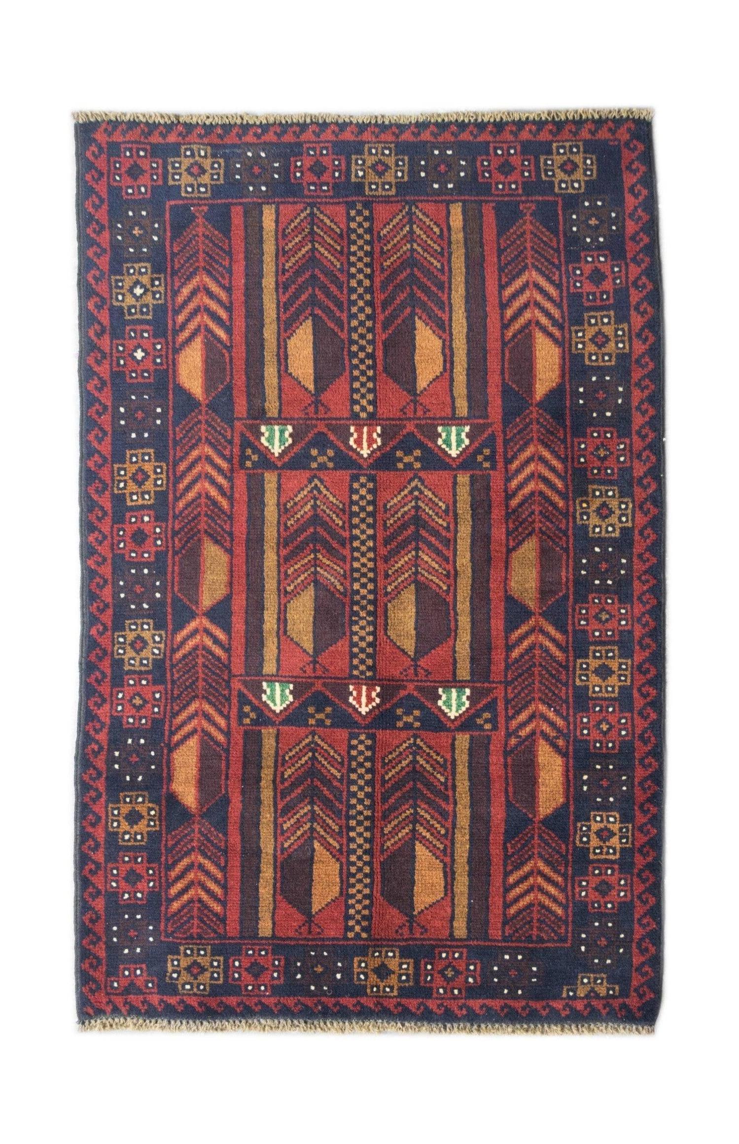 Handmade Afghan Pashm rug featuring traditional geometric patterns in red, brown, and blue tones.