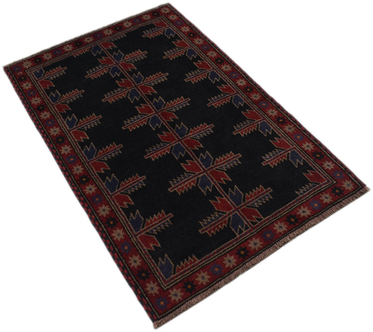 Handmade Afghan Baluch rug featuring a dark field with geometric red and blue tribal patterns.
