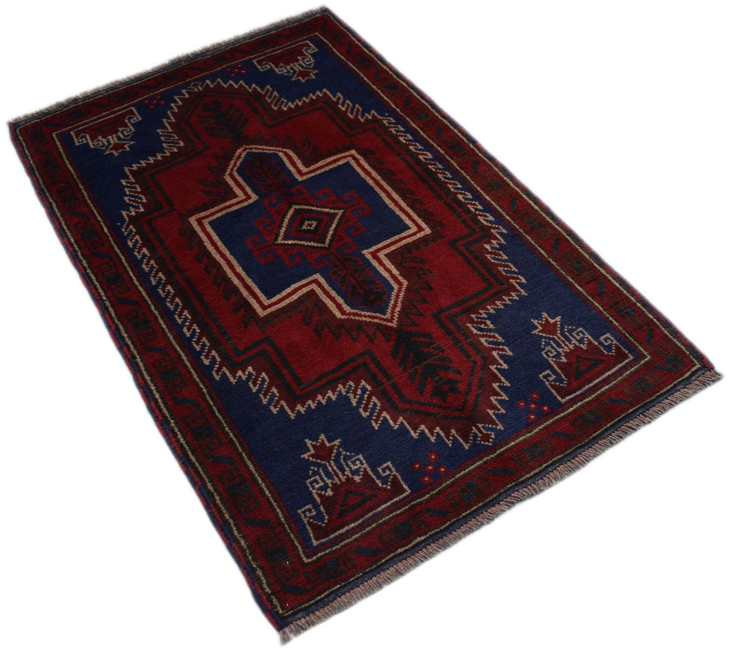 Handmade Afghan Baluch wool rug featuring a geometric tribal pattern in red, blue, and ivory.