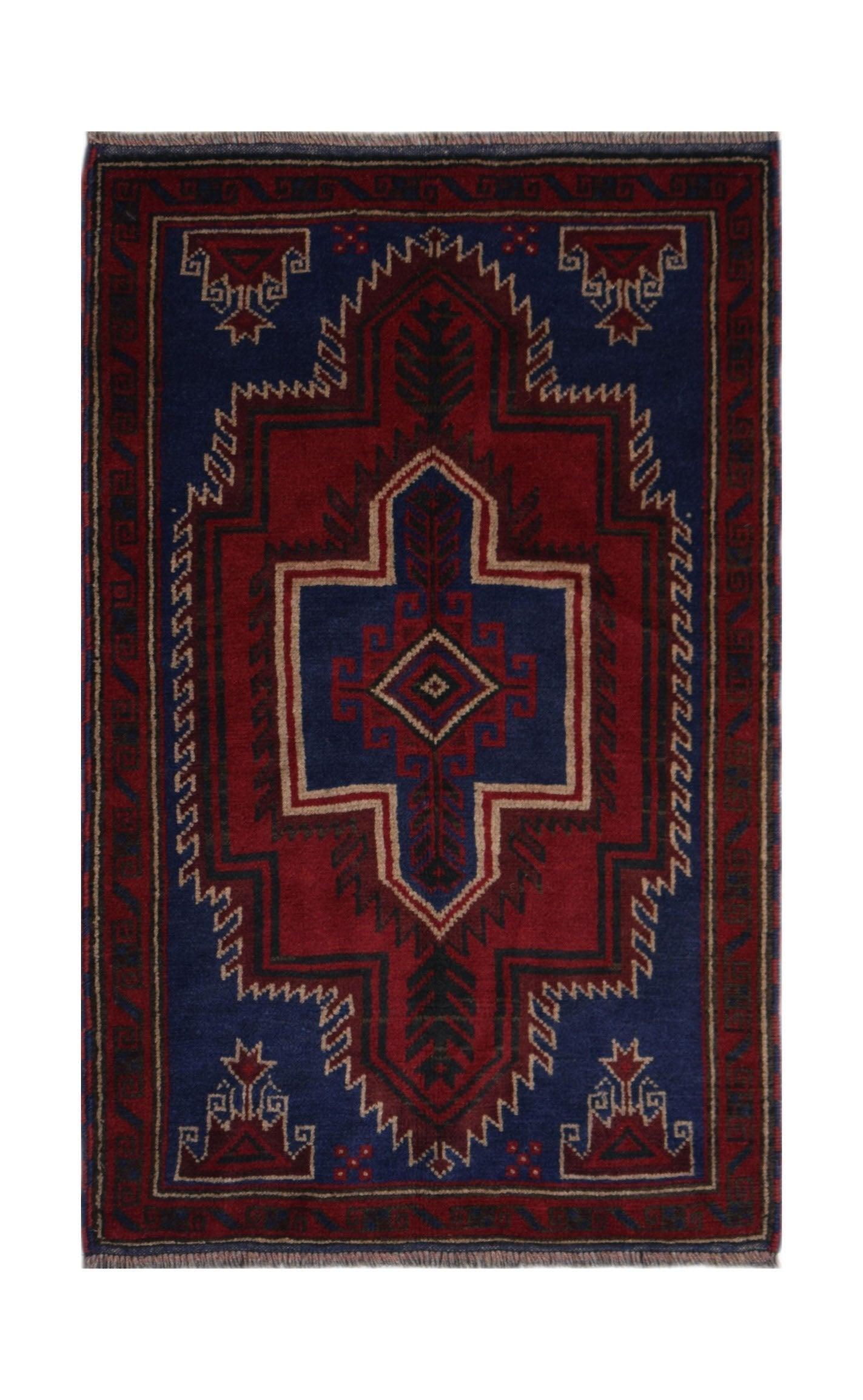 Handmade Afghan Baluch rug featuring a geometric tribal pattern in deep red and blue tones.
