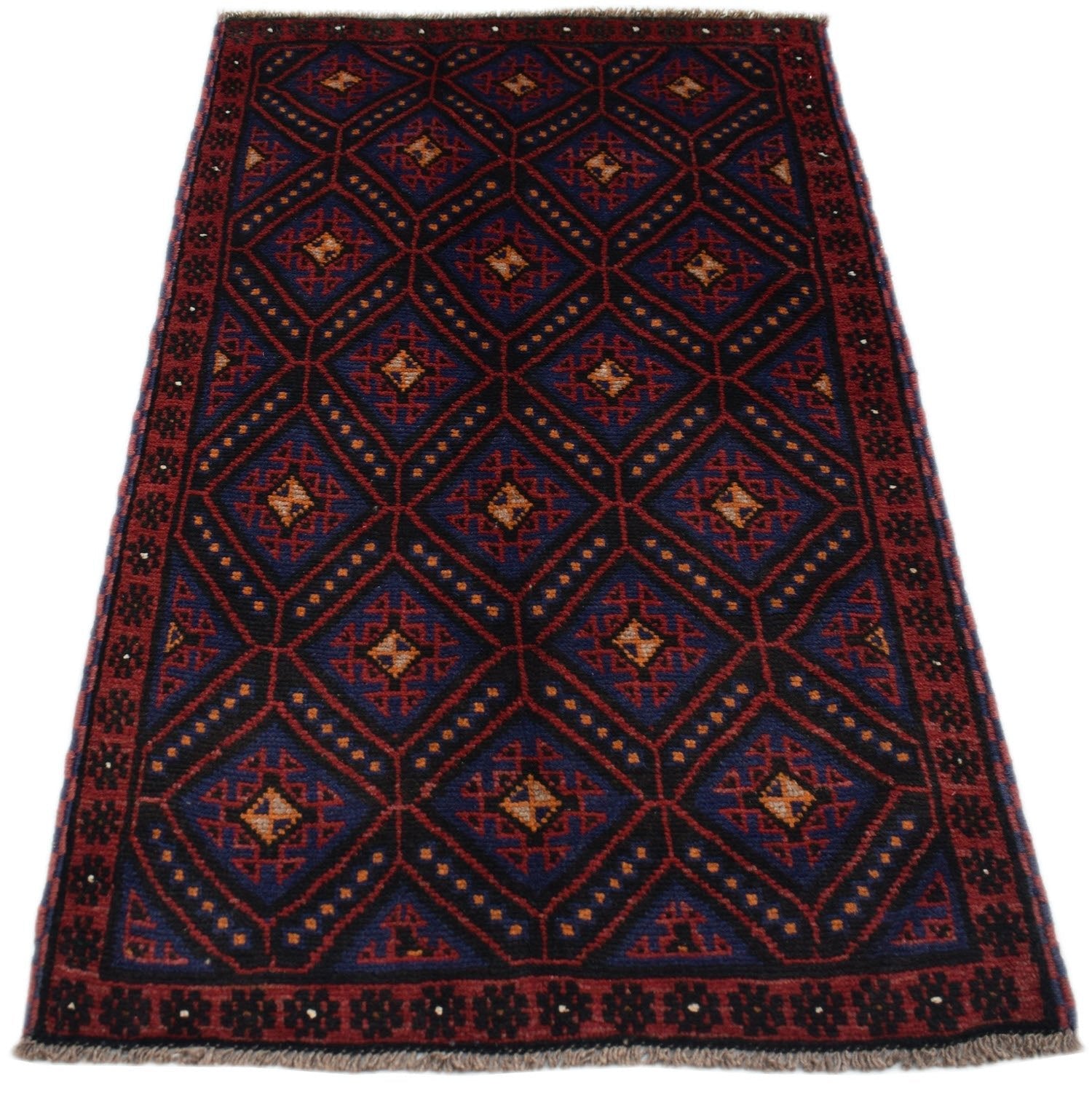 Handmade Afghan Baluch rug featuring a dark blue and red diamond pattern with ivory accents.