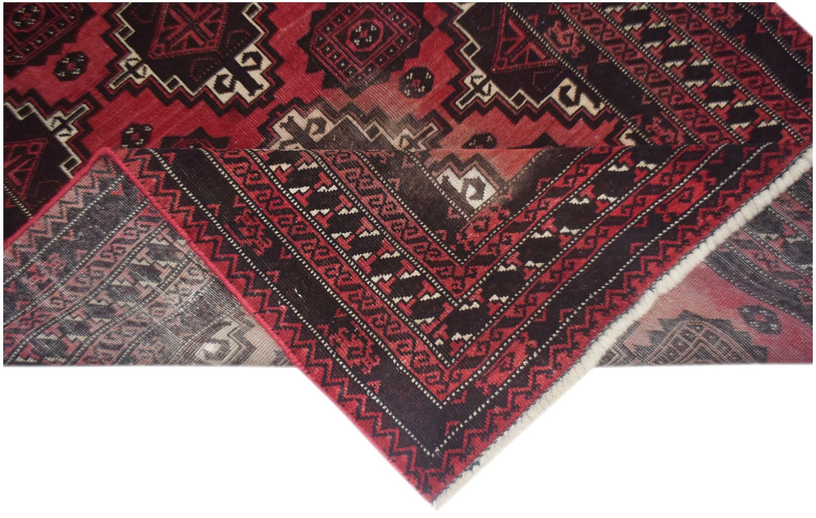 A vintage handmade Afghan Baluch wool rug featuring geometric patterns in red and dark brown.