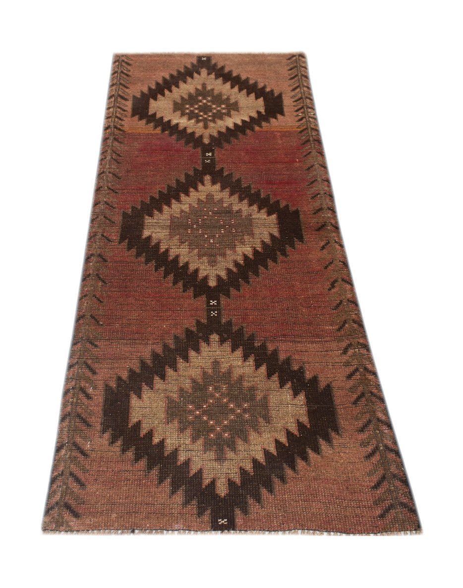 Handmade Afghan Baluch runner rug featuring three large brown diamond motifs on a red background.