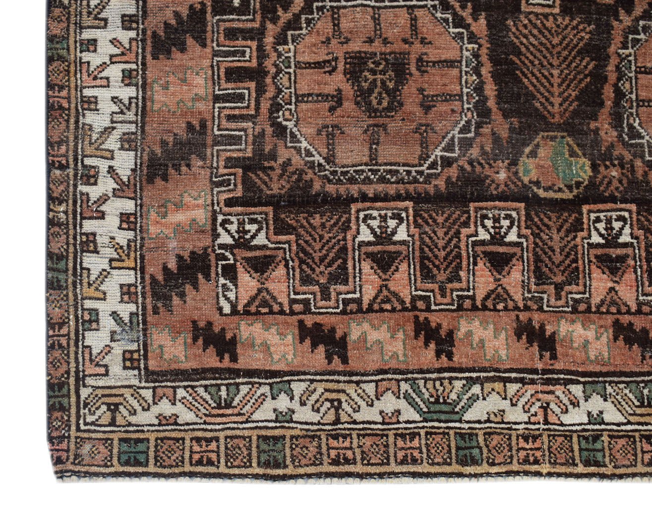 A handmade Afghan Baluch rug featuring geometric patterns in shades of brown, cream, and green.