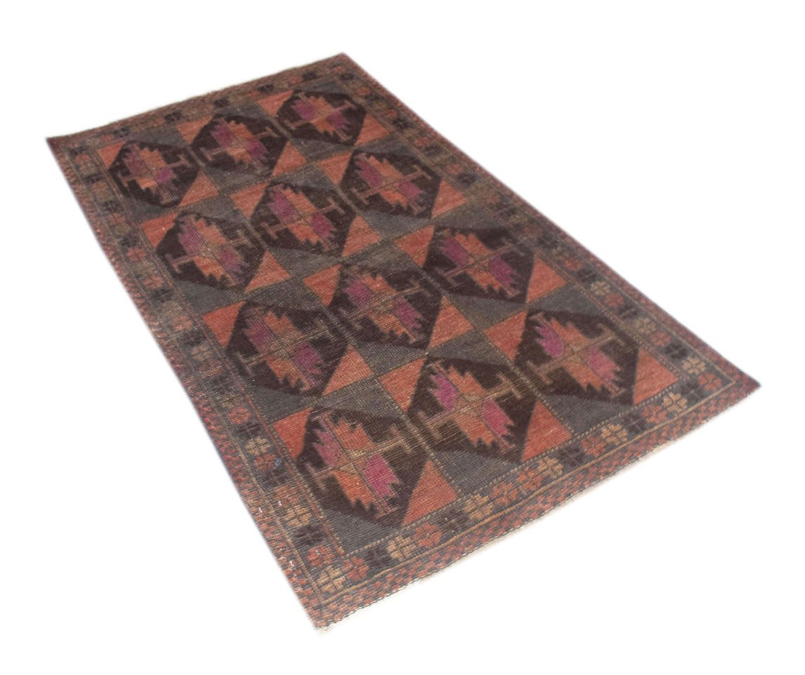 Handmade Afghan Baluch rug featuring a geometric diamond pattern in shades of brown and red.