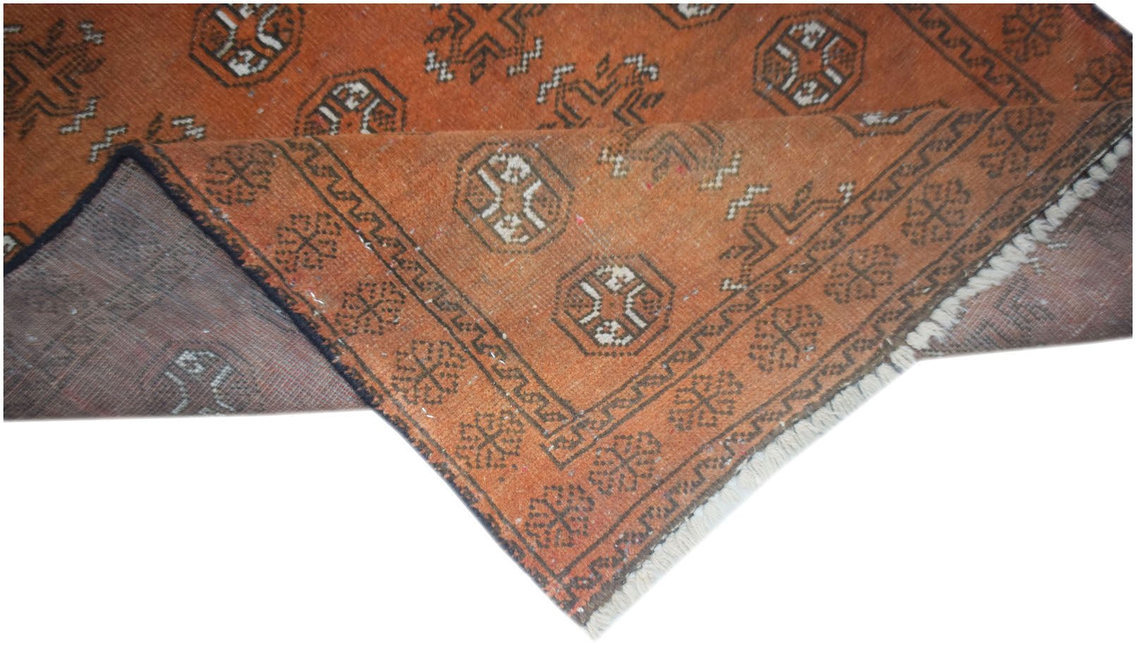 Handmade Afghan Baluch rug featuring a geometric pattern in shades of orange and dark brown.