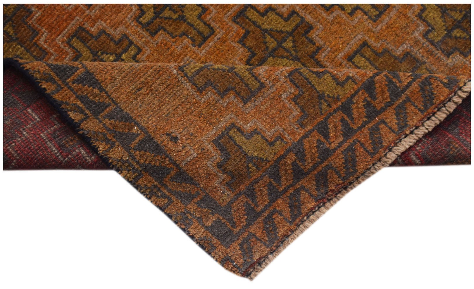 A handmade Afghan Baluch rug featuring a geometric pattern in shades of orange, brown, and olive.