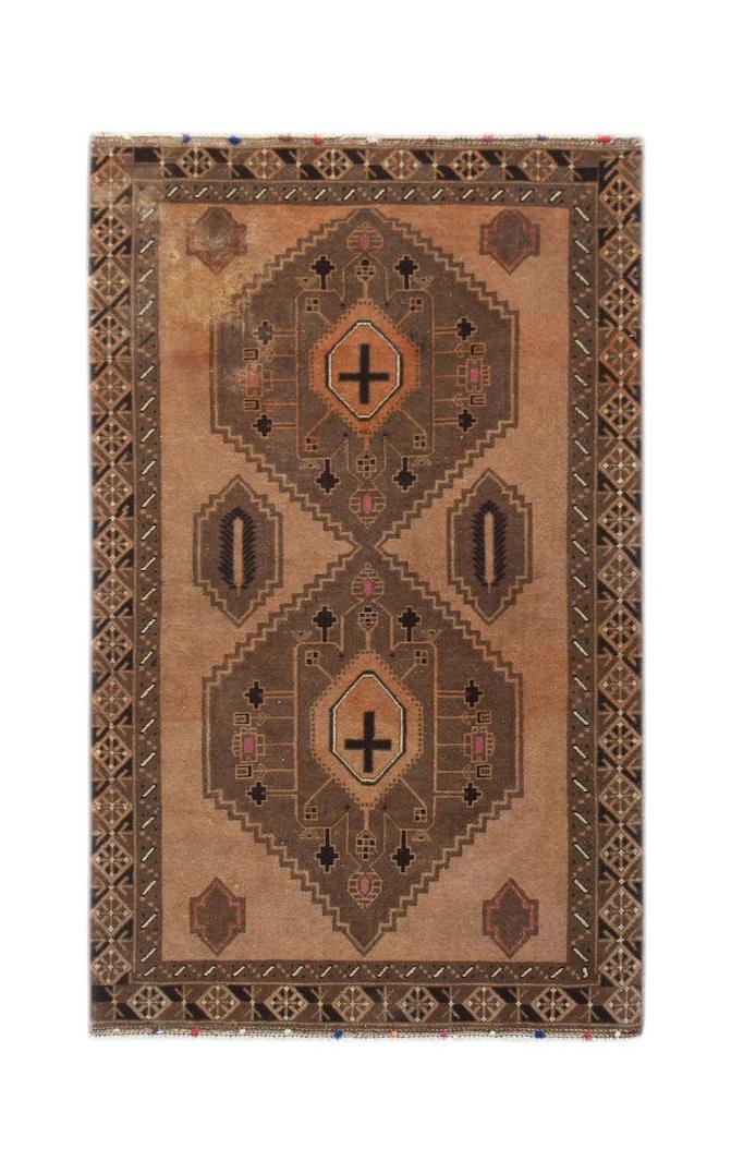 Handmade Afghan Baluch rug featuring two dark brown diamond medallions on a tan field.