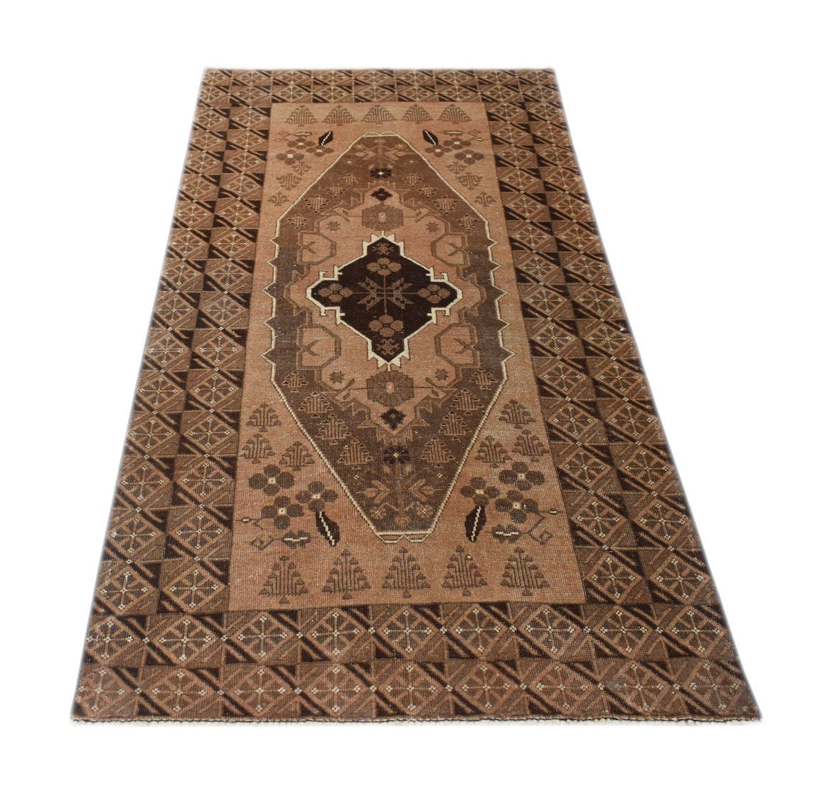 Handmade Afghan Baluch rug featuring a geometric diamond medallion in shades of brown and tan.