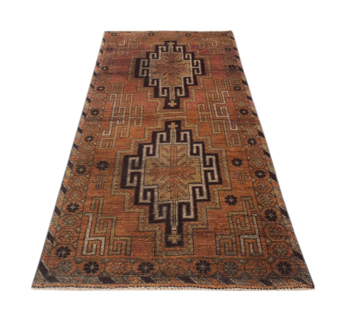 Handmade Afghan Baluch rug featuring geometric diamond motifs in shades of orange and brown.