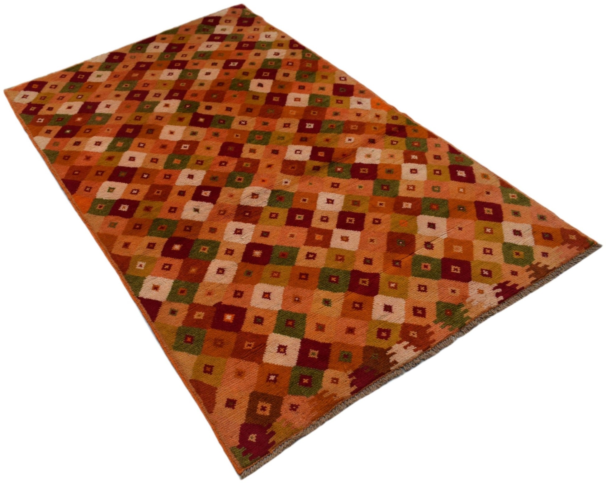 A handmade Afghan Baluch rug featuring a geometric pattern of multicolored squares in wool.