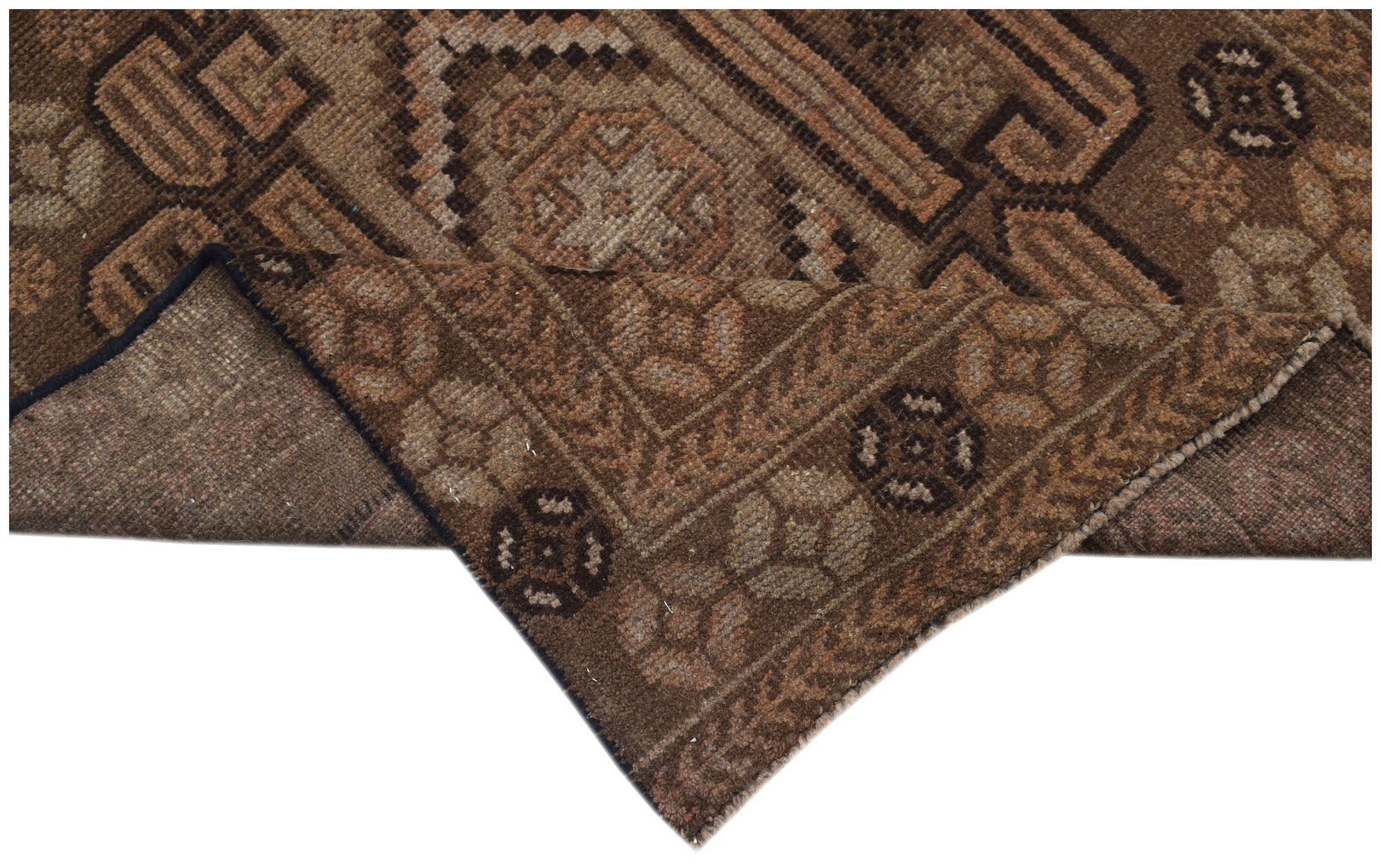A handmade Afghan Baluch rug featuring traditional geometric patterns in shades of brown.